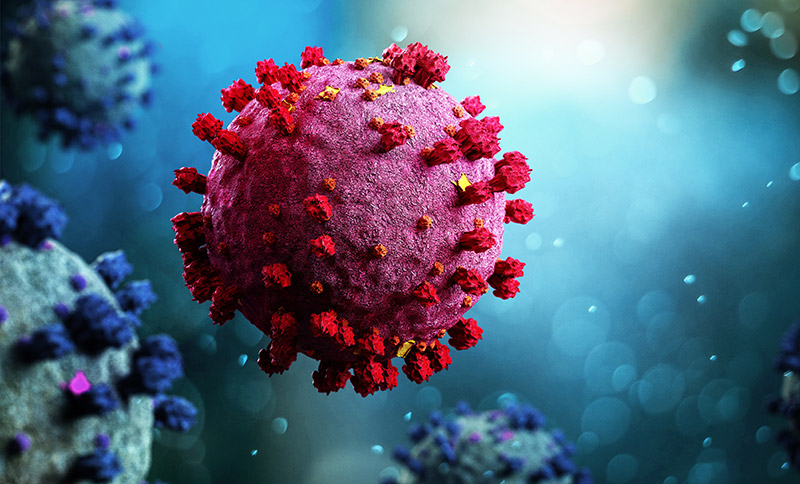 Digital bild på corona-virus, viruset är rött och runt med en blå bakgrund.