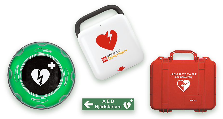 Hjärtstare i vit färg med ett rött hjärta en lifepak CR2, en röd väska med vit text och vitt hjärta. Ett grönt plastskåp med svart bakgrund och vitt hjärta. Grön skylt med texten hjärtstartare. 