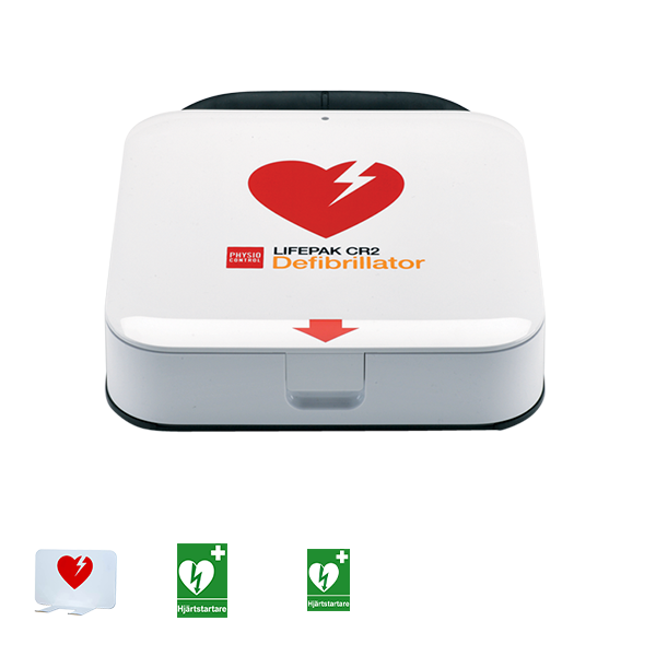 Hjärtstartare Lifepak CR2 i ett hjärtstartarpaket tillsammans med ett väggfäste och två gröna skyltar. 