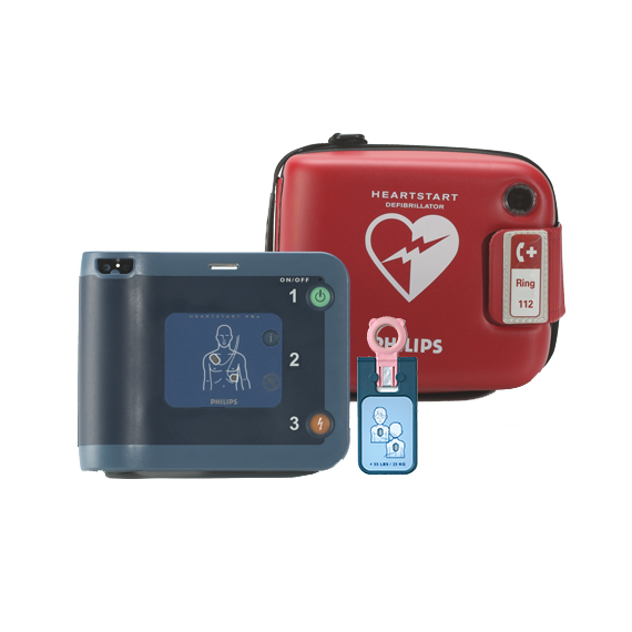 Hjärtstartare Philips FRX och tillhörande väska/fodral samt barnnyckel. Hjärtstartaren är blå och väskan är röd med en vit hjärtstartarsymbol på.